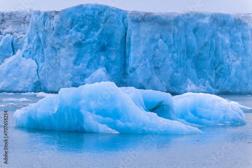 Iceberg at a glacier shelf in arctic