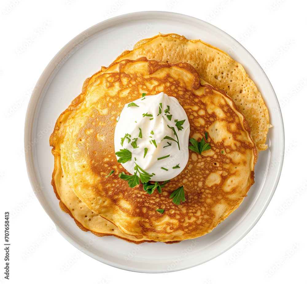 A plate of chickpea pancake with a dollop of cashew sour cream top view isolated on a transparent background A plate of chickpea pancake with a dollop of cashew sour cream top view isolated on a transparent background