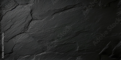 Dark grey black slate texture background. Black stone texture. Black granite slabs background 