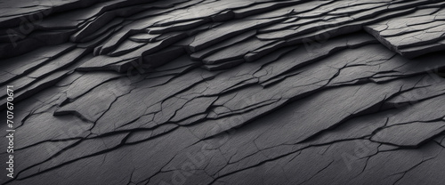 Black white rock texture background. Rough mountain surface with cracks. Close-up. Dark gray stone basalt background for design. Banner. Wide. Long. Panoramic. Website header. photo