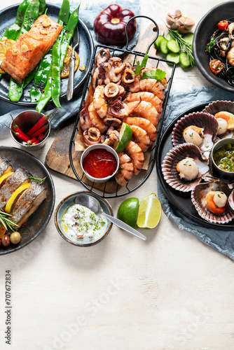 Assortment variousfish dishes - octopus, shrimp, crab, seafood, mussels, salmon.