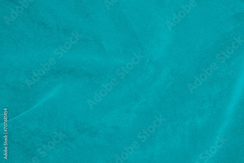 Tiffany color blue velvet fabric texture used as background. silk color denim fabric background of soft and smooth textile material. crushed velvet .luxury navy blue light tone for silk.