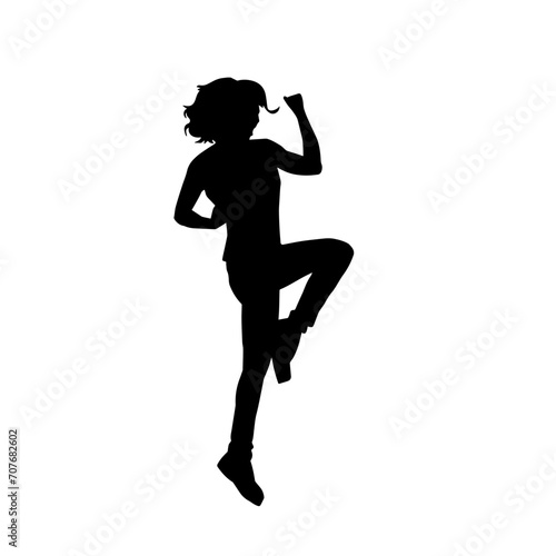 Silhouette of a female dancer in action pose. Silhouette of a woman dancing happily.