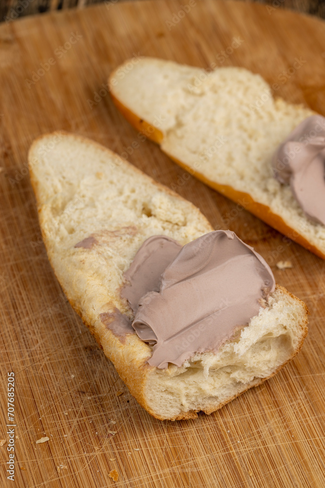 making a sandwich with chocolate-flavored cheese