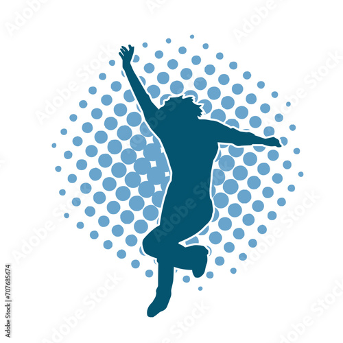 Silhouette of a female dancer in action pose. Silhouette of a woman dancing happily.