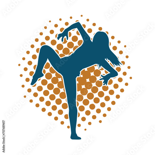 Silhouette of a female dancer in action pose. Silhouette of a woman dancing happily.