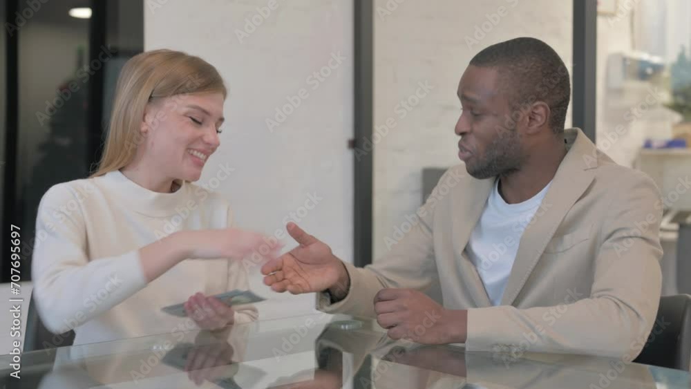 African Man Shaking Hand after Giving Money to Woman African Man Shaking Hand after Giving Money to Woman