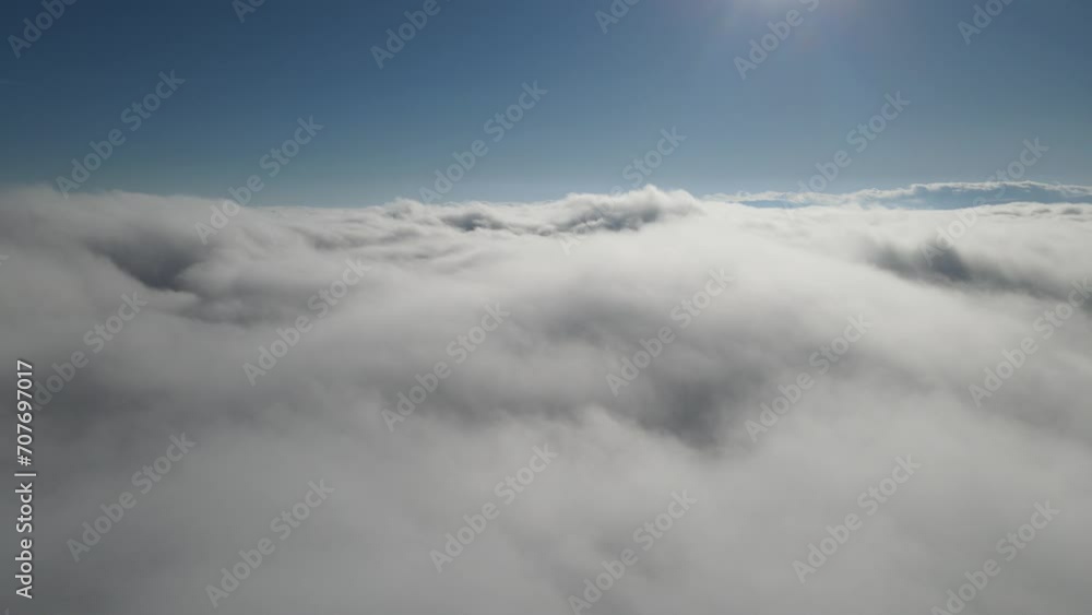 Drone view through cloudy sky, beautiful view in fluffy sky Drone view through cloudy sky, beautiful view in fluffy sky
