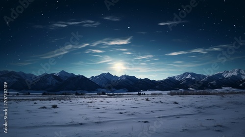full moon setting over the bridger mountains in winter near bozeman, montana photo