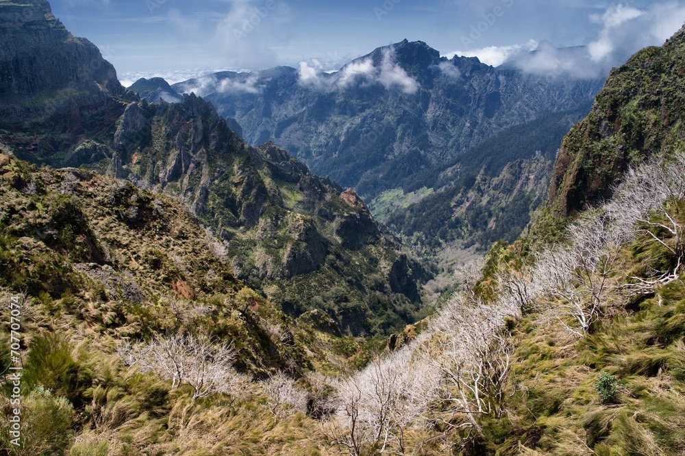Pico do Arieiro – Pico Ruivo trek in Madeira, Portugal. PR1 hike. Vereda do Pico Ruivo. View of the valley.	