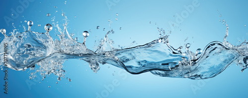Water splashes with drops on a blue background