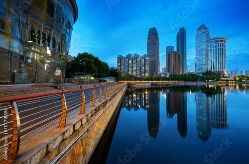 Skyscrapers by the lake, night view of Wuhan, China.