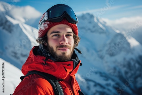 Studio portrait of a young European man with a winter sports theme, wearing ski attire, isolated on a snowy mountain background