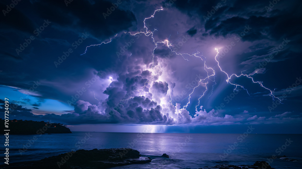An intense lightning storm over the ocean with multiple bolts striking the water and illuminating the dark clouds.