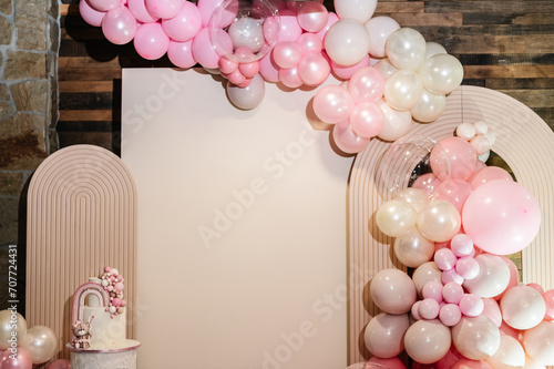 Fotografie Arch decorated with pink, brown balloons