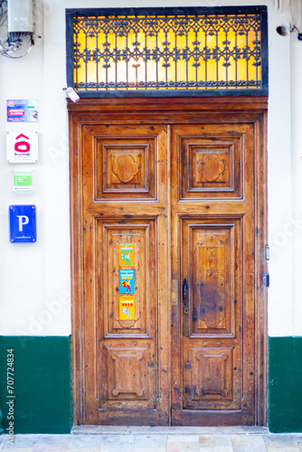 old wooden door of hotel in european city