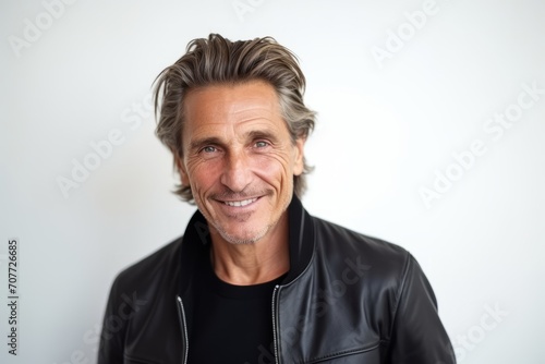 Portrait of a handsome middle-aged man smiling at the camera