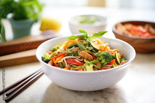 colorful bowl of sausage and fresh vegetable stir-fry photo