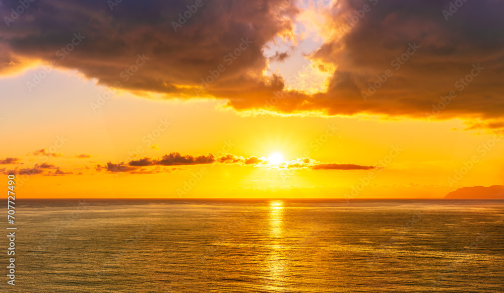 scenic landscape of colorful sunset or sunrise above water, evening or morning seascape