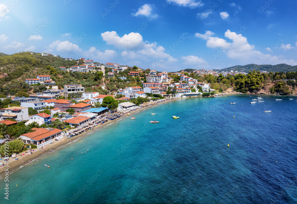 The popular beach of Megali Ammos next to the main town of Skiathos island, Sporades, Greece
