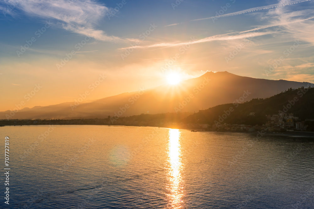 Fototapeta premium picturesque view to a sunset sea gulf with beautiful mountains and amazing cloudy sky on background of nice travel landscape