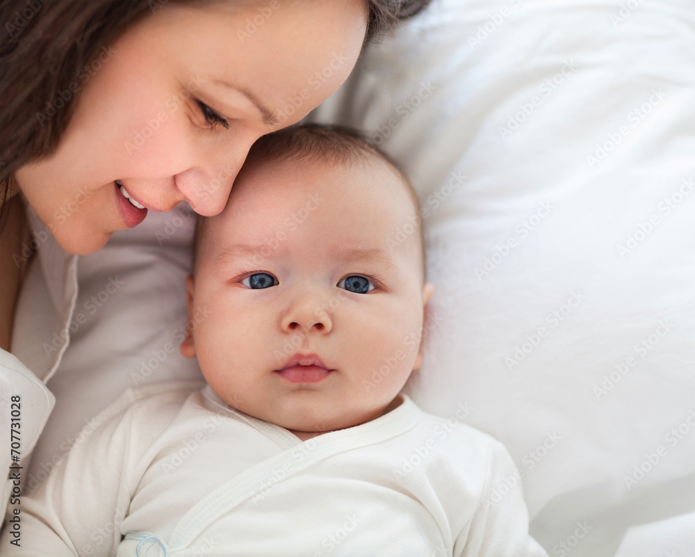Portrait of mother and child laughing and playing Portrait of mother and child laughing and playing