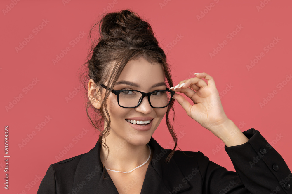 Attractive young business lady in glasses and suit Attractive young business lady in glasses and suit