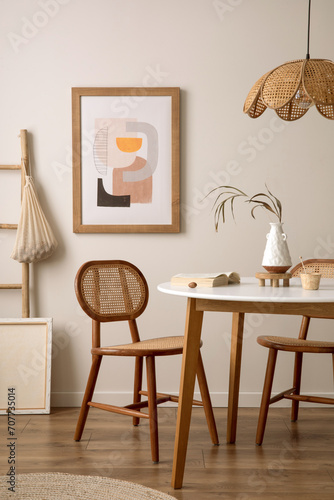 Εκτύπωση καμβά Creative composition of dining room interior with round table, rattan chair, wooden commode, pock up poster and kitchen accessories