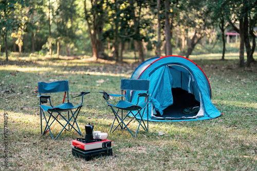 tent and camping in forest, dinner and adventure on nature background. camping background concept