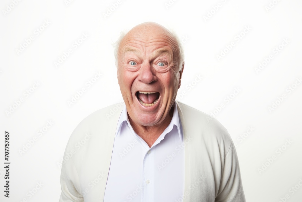 Surprised senior man looking at camera. Isolated on white background. Surprised senior man looking at camera. Isolated on white background.