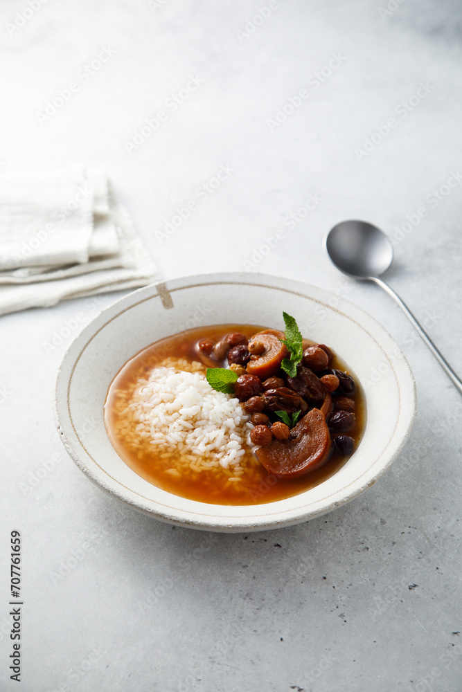 Traditional dried fruits soup with rice Traditional dried fruits soup with rice
