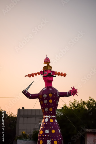 Ravnans being ignited during Dussera festival at ramleela ground in Delhi, India, Big statue of Ravana to get fire during the Fair of Dussera to celebrate the victory of truth by Lord Rama photo