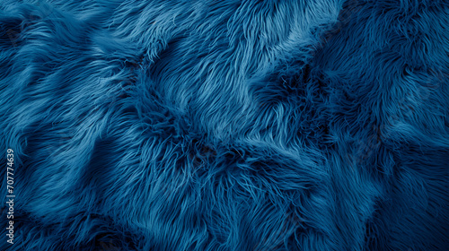 Blue fur texture top view. Blue sheepskin background. Fur pattern