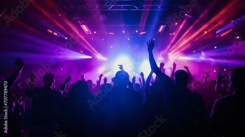 Euphoric Crowd at a Vibrant Neon Music Concert. Generative ai © Scrudje