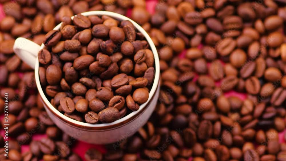 coffee cup with fresh beans rotation. heap of fresh coffee beans close-up. baristo prepares coffee from beans coffee cup with fresh beans rotation. heap of fresh coffee beans close-up. baristo prepares coffee from beans