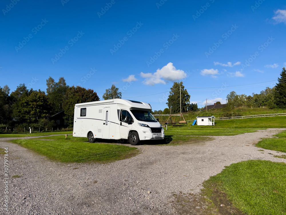 Motorhome camper in a campsite near Oslo, south Norway. Europe Motorhome camper in a campsite near Oslo, south Norway. Europe