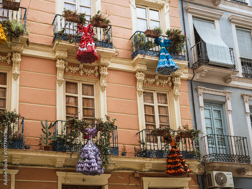 Φωτογραφία Traditional flamenco dance dresses costumes hanging on a spanish andalusian hous