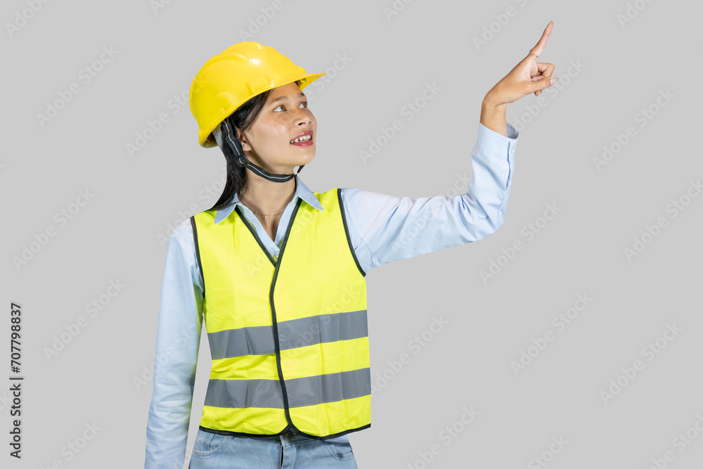 Female Asian Construction Worker and Engineer giving expressions and gestures of happiness and excitement Female Asian Construction Worker and Engineer giving expressions and gestures of happiness and excitement
