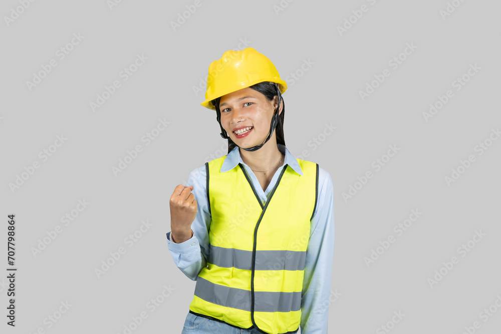 Female Asian Construction Worker and Engineer giving expressions and gestures of happiness and excitement Female Asian Construction Worker and Engineer giving expressions and gestures of happiness and excitement
