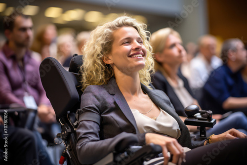 Smiling young women in a crowd at a sports demonstration: the face of a beautiful female athlete in a wheelchair at an outdoor rally.