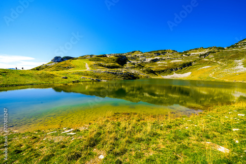 Fototapeta Naklejka Na Ścianę i Meble -  View of the surrounding landscape and Lake Augstsee at the Loseralm near Altaussee in the Salzkammergut in Austria. Nature with panoramic views of the mountains on the Loser Alm in Styria.

