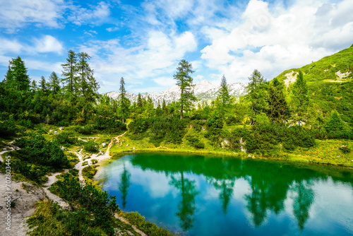Fairy tale lake on the high plateau of the Tauplitzalm. View of the lake at the Totes Gebirge in Styria. Idyllic landscape with mountains and a lake on the Tauplitz.
 photo