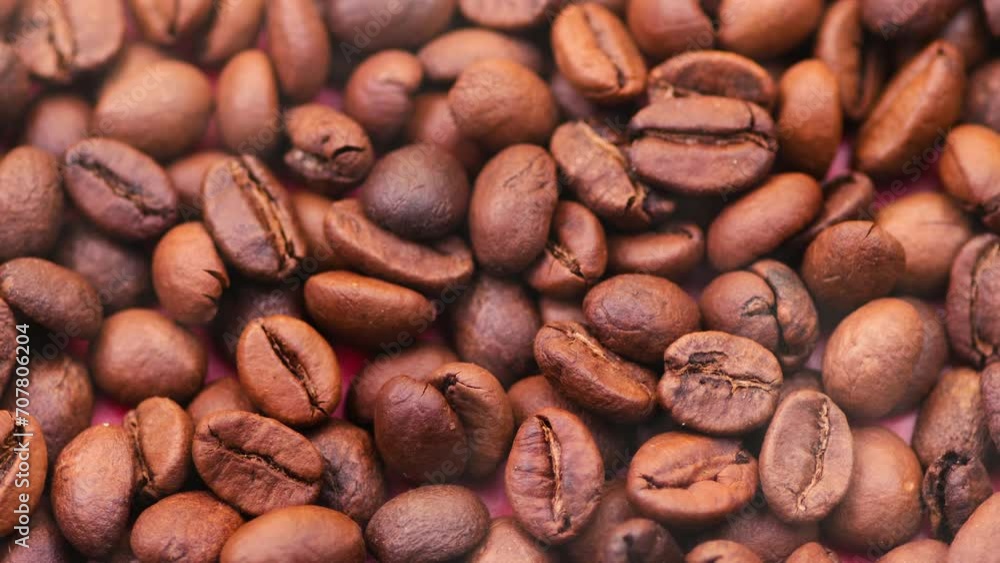 pile of coffee beans with smoke rotation. The baristo prepares coffee from fresh beans. coffee bean harvest pile of coffee beans with smoke rotation. The baristo prepares coffee from fresh beans. coffee bean harvest