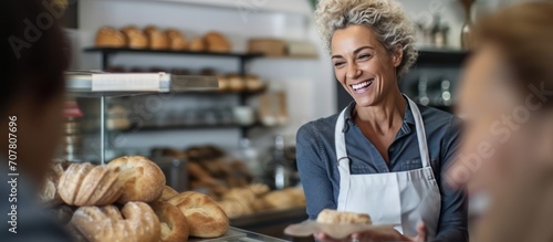 female workers selling bread are friendly and full of smiles