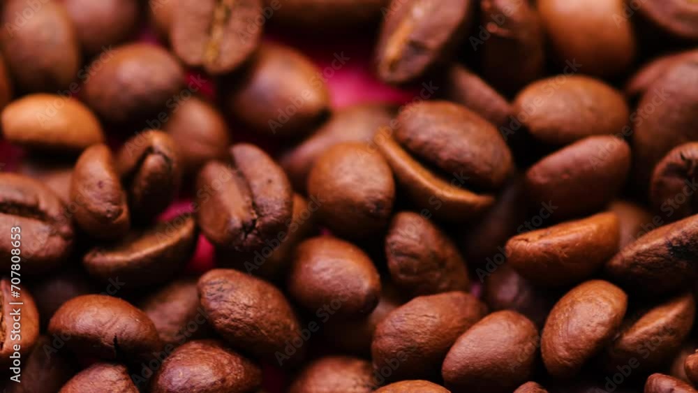 close-up of coffee beans rotation. preparing coffee from beans. barista prepares coffee from beans close-up of coffee beans rotation. preparing coffee from beans. barista prepares coffee from beans