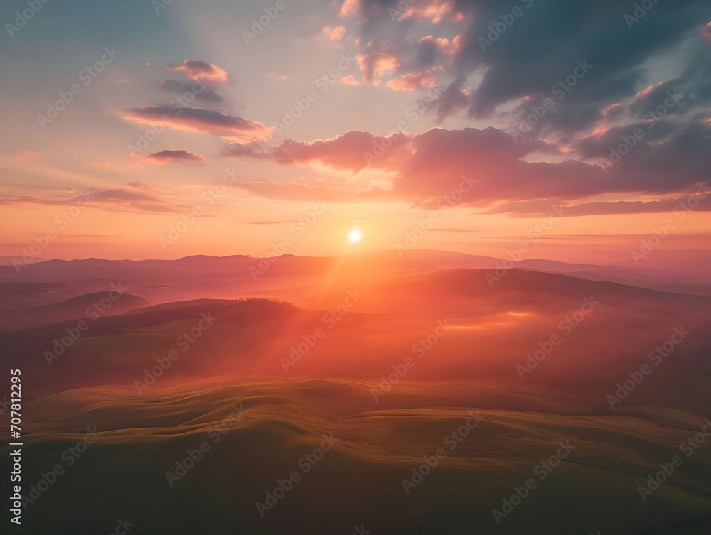 Sunrise over the horizon of the mountains aerial view cinematic photo. High-resolution