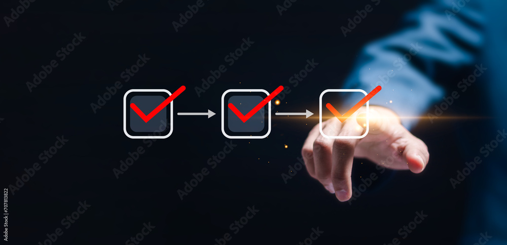 Businessman tick correct marks to paperless online approval for business process workflow illustrating management approval and and project approve concept. Businessman tick correct marks to paperless online approval for business process workflow illustrating management approval and and project approve concept.