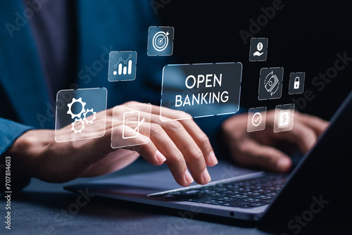 Open banking financial technology fintech concept. businessman use laptop with virtual screen of open banking icon. api financial technology, fintech.