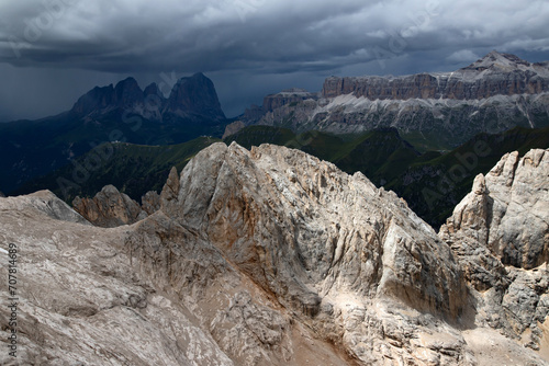 The view of Sassolungo and the Sella Group from Serauta in the Dolomites, Italy. photo