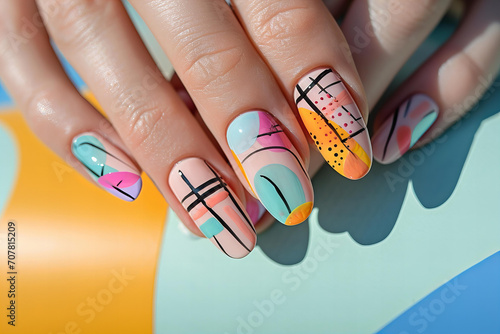 Perfect manicure in pastel colors with bauhaus brutalism retro print hand painted on nails, nail salon ad photo